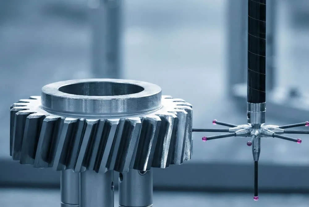 Quality control technician performing CMM inspection on high-precision custom cnc machining parts to ensure H7 tolerances